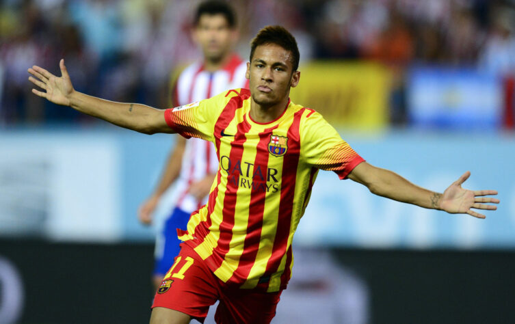 21/08/2013- Um gênio em ascensão. Neymar, sempre decisivo, em seu segundo jogo oficial pelo Barcelona, sai do banco e empata a final da Supercopa da Espanha, diante do Atlético de Madrid. Foto: JAVIER SORIANO/AFP