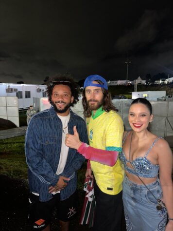 Além de ter subido no palco da banda de rock '30 Seconds To Mars', Marcelo ainda presenteou o vocalista Jared Leto com uma camisa do Fluminense. O jogador compartilhou o registro nas redes sociais. Veja mais fotos do momento!