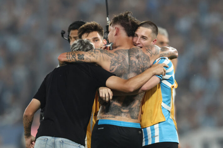 Jogadores do Racing celebrando a classificação